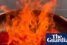 Trump supporters burn Maga hats after he dismisses Epstein files furor as ‘hoax’ | Jeffrey Epstein