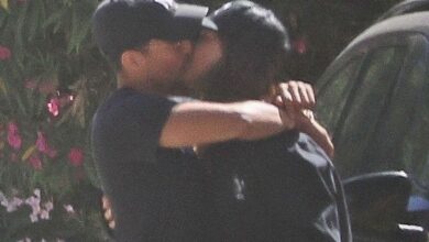 Two individuals embracing outdoors