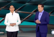Carolina Ferraz e Roberto Cabrini. Foto: Reprodu&ccedil;&atilde;o/Record