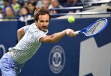 Jul 31, 2025; Toronto, ON, Canada; Daniil Medvedev plays a shot against Alexei Popyrin (AUS) during third round play at Sobeys Stadium.