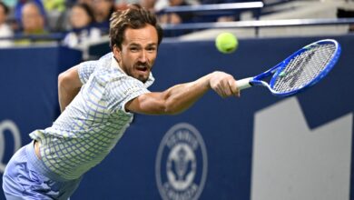 Jul 31, 2025; Toronto, ON, Canada; Daniil Medvedev plays a shot against Alexei Popyrin (AUS) during third round play at Sobeys Stadium.